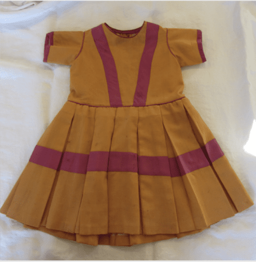 Repaired toddler short-sleeve gold dress with wide pink stripes.